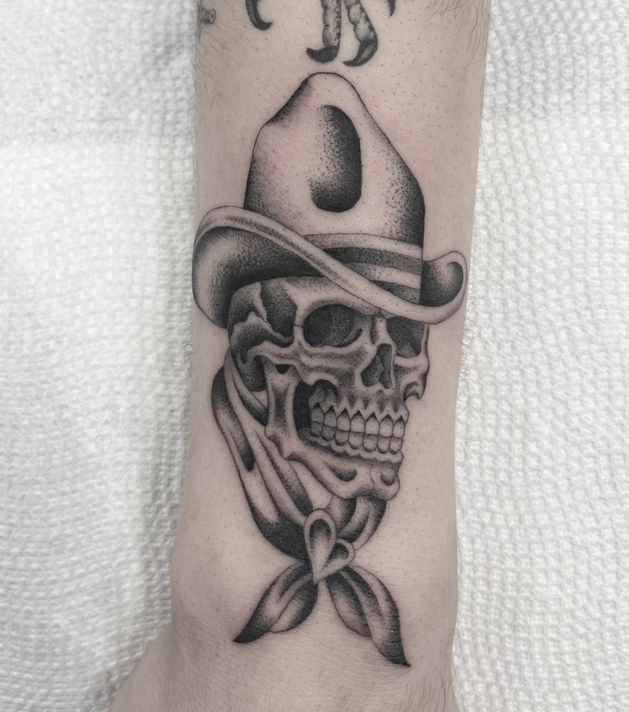 fineline-american-traditional-cowboy-skull-tattoo