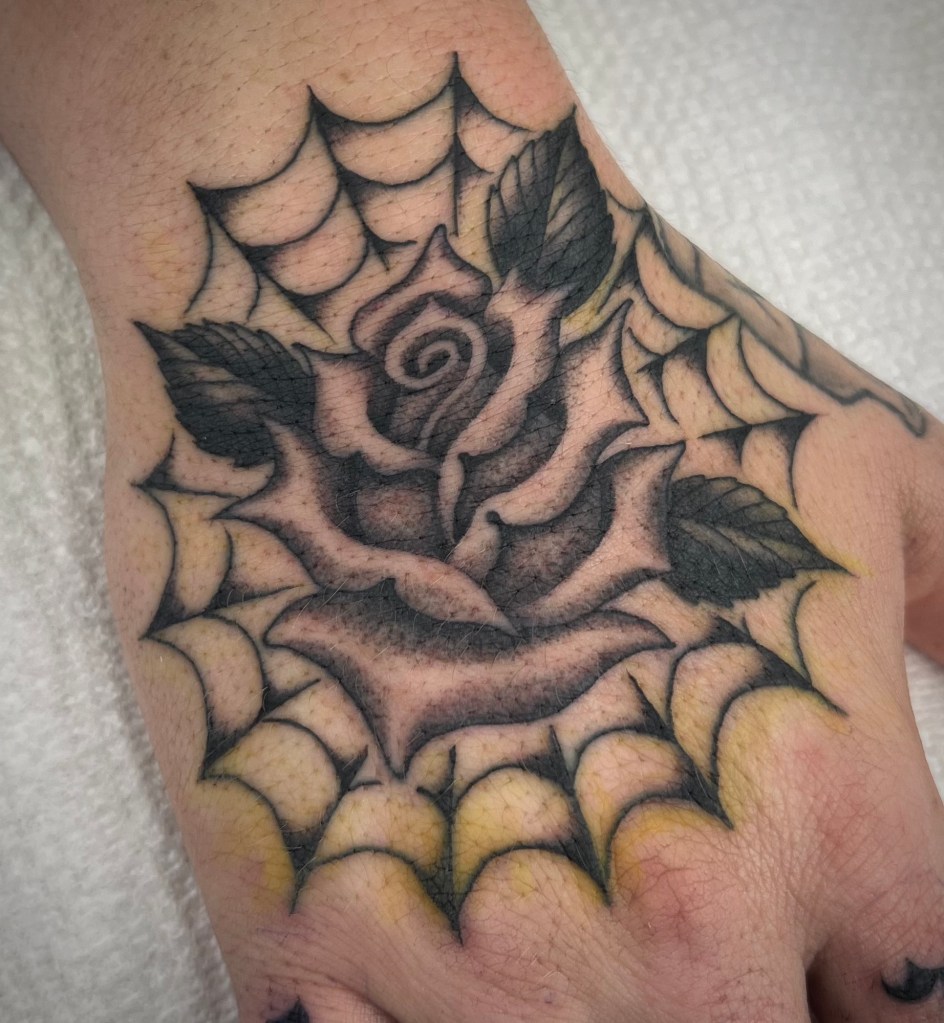 rose-web-hand-tattoo-san-diego
