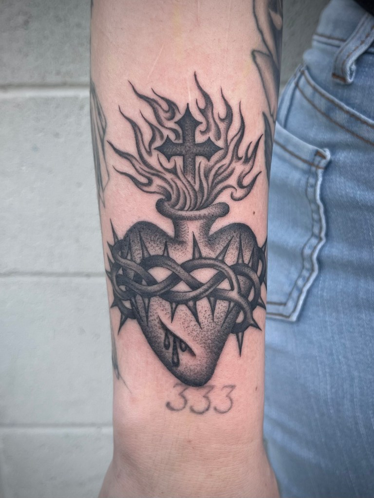fine line sacred heart tattoo